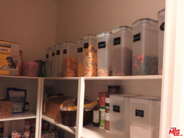 a dining room table with chairs and window