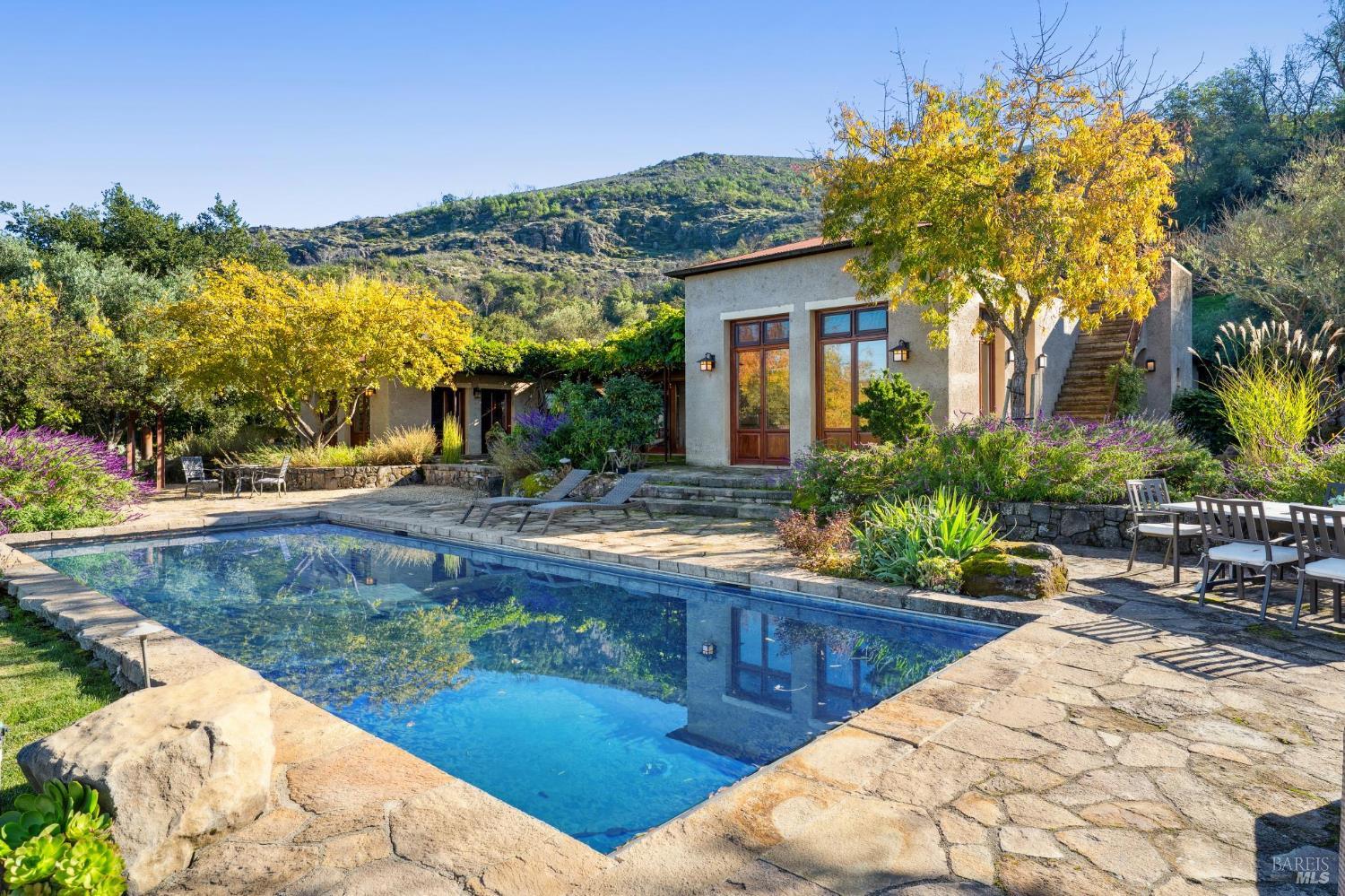 2846 Monticello Road Napa, CA 94558 - Photo 11 of 61 a view of a house with backyard and sitting area
