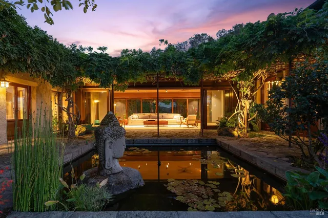 a view of a lake with a yard