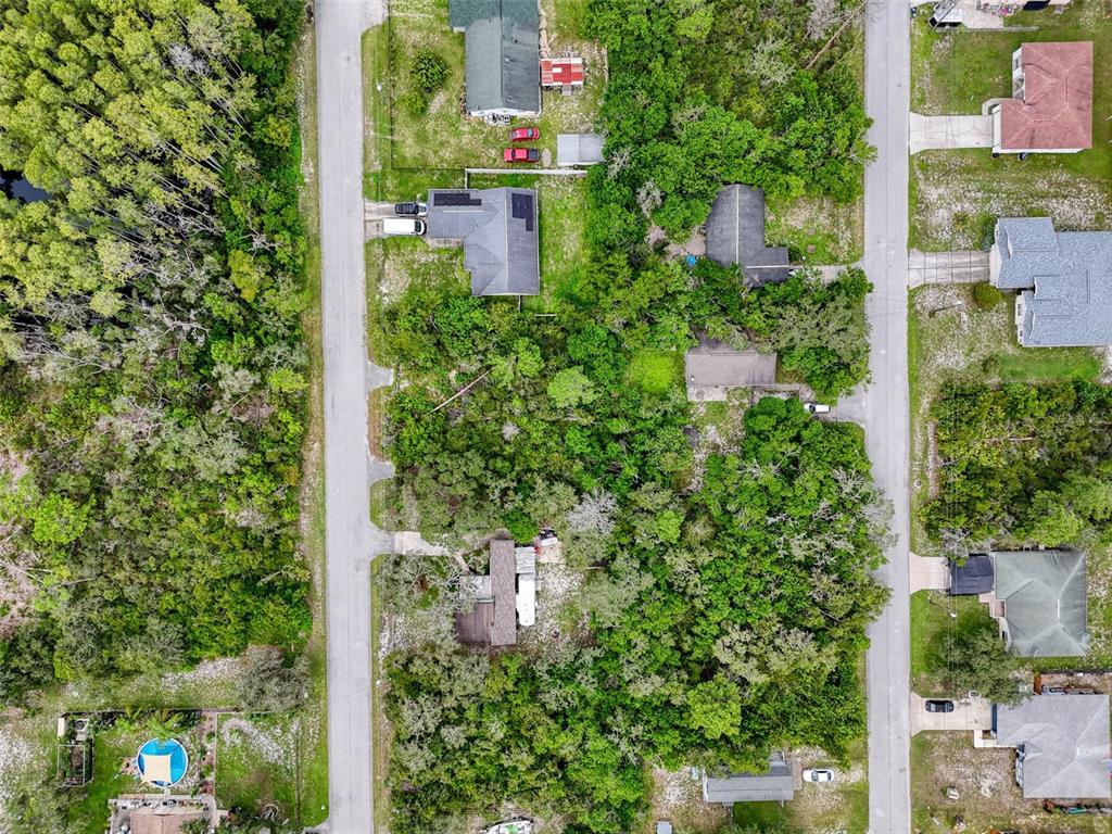 71 St 72 & 73 New Port New Port Richey, FL 34654 - Photo 19 of 37 an aerial view of residential house with outdoor space and street view