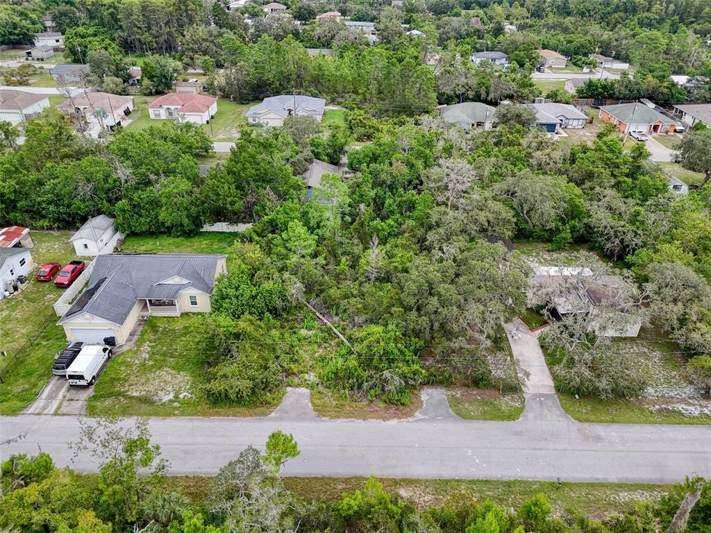 71 St 72 & 73 New Port New Port Richey, FL 34654 - Photo 2 of 37 an aerial view of residential house with outdoor space and trees all around