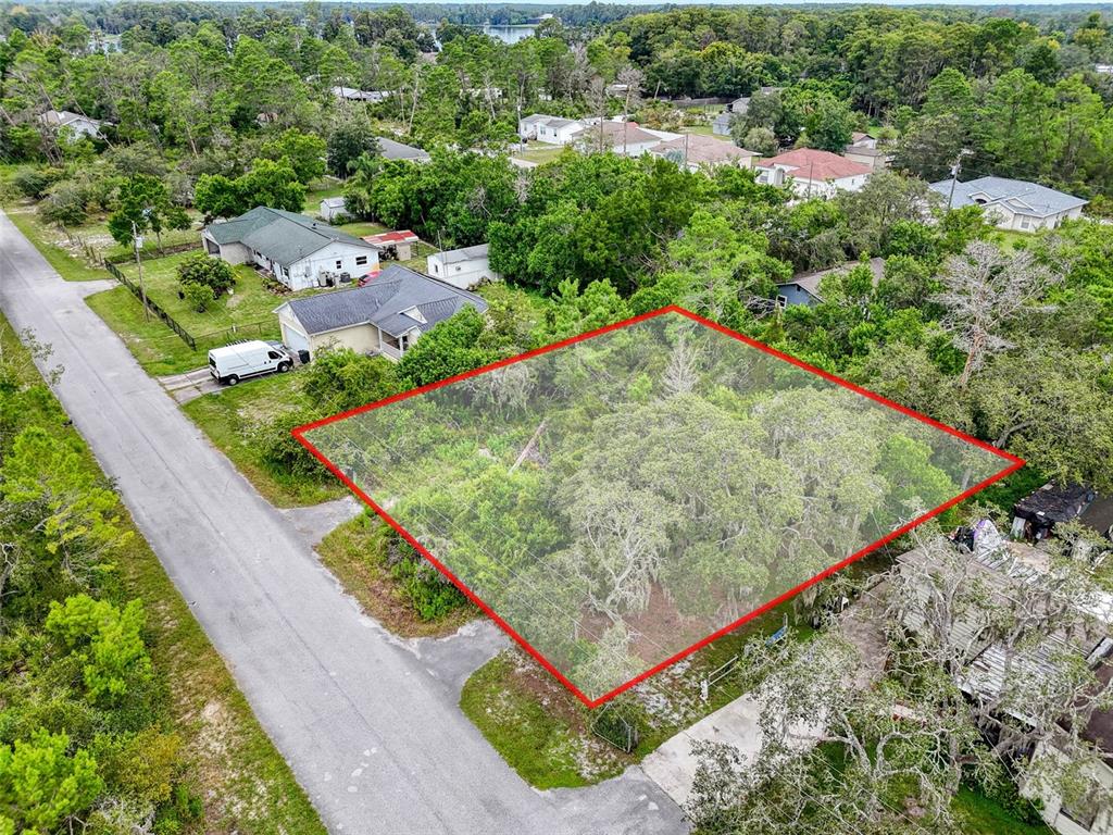 71 St 72 & 73 New Port New Port Richey, FL 34654 - Photo 21 of 37 an aerial view of a backyard