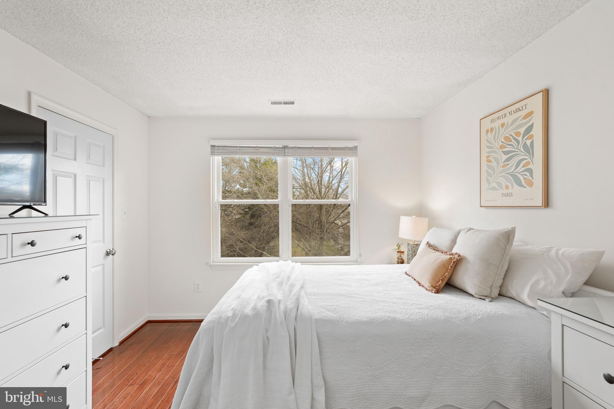 12901 Churchill Ridge Circle, Unit 13 Germantown, MD 20874 - Photo 26 of 44 a bedroom with a bed and a window