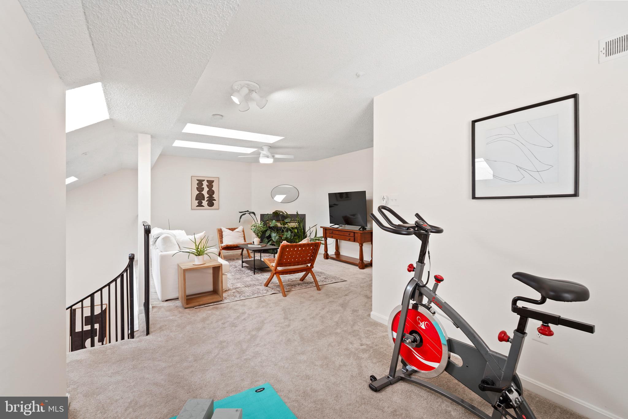 12901 Churchill Ridge Circle, Unit 13 Germantown, MD 20874 - Photo 32 of 44 a view of gym equipment and children play room