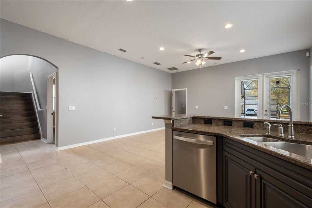 13118 Sunkiss Loop Windermere, FL 34786 - Photo 18 of 52 a kitchen that has a sink and a stove