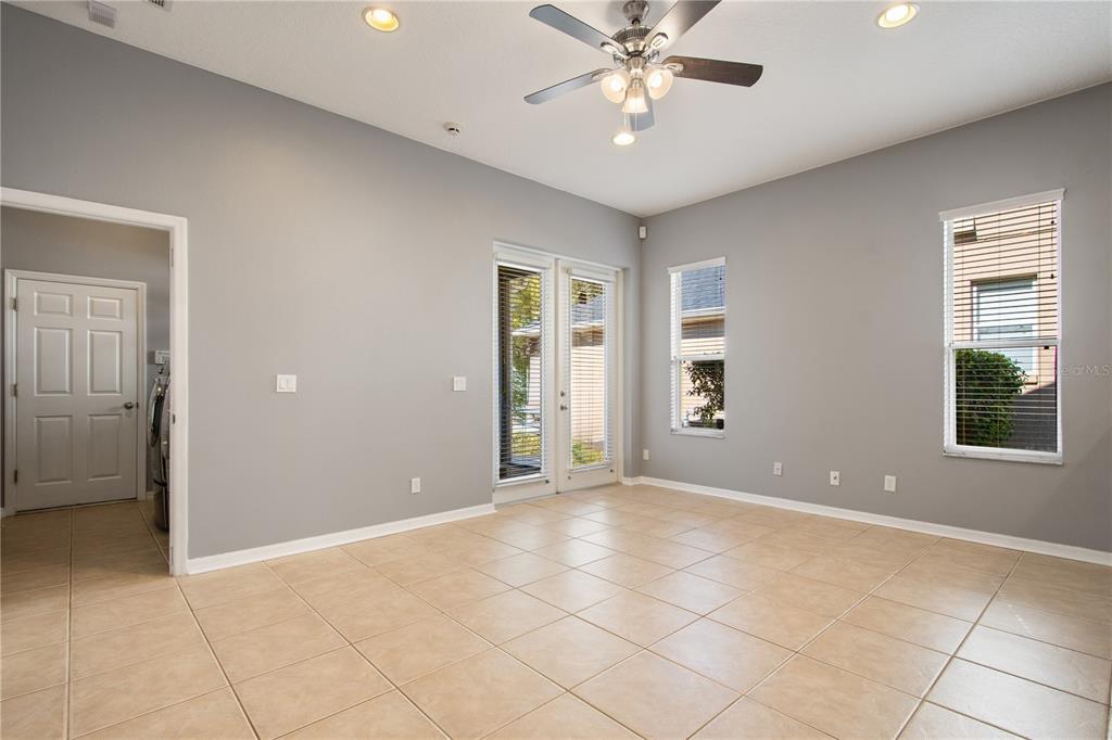 13118 Sunkiss Loop Windermere, FL 34786 - Photo 21 of 52 a view of an empty room with a window