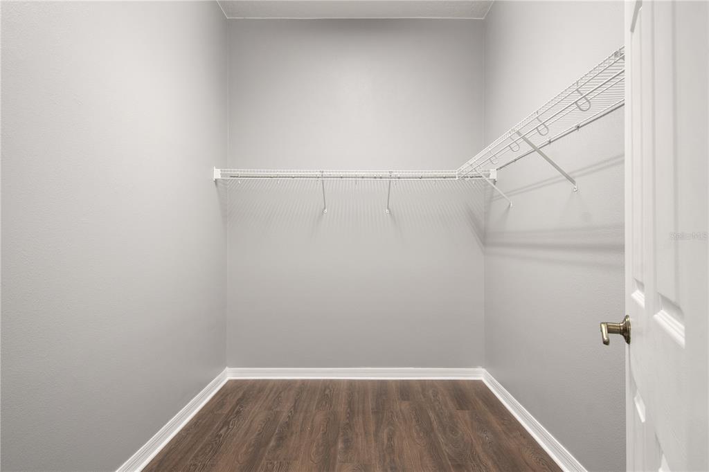 13118 Sunkiss Loop Windermere, FL 34786 - Photo 32 of 52 a view of a room with wooden floor