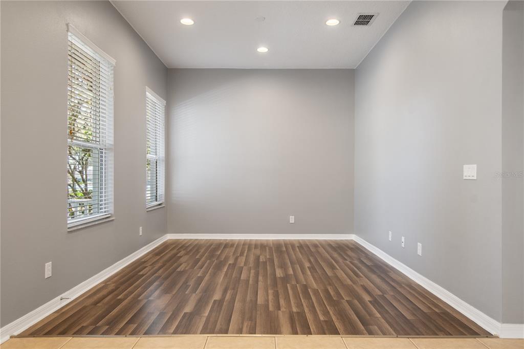 13118 Sunkiss Loop Windermere, FL 34786 - Photo 38 of 52 wooden floor in an empty room with a window