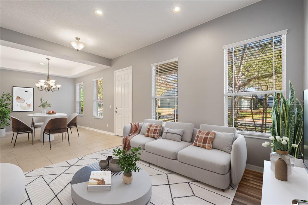 13118 Sunkiss Loop Windermere, FL 34786 - Photo 6 of 52 a living room with furniture and a large window