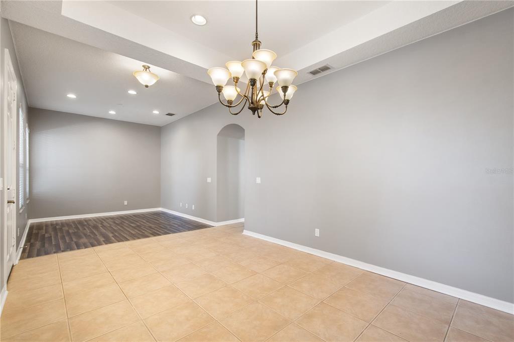 13118 Sunkiss Loop Windermere, FL 34786 - Photo 8 of 52 a view of a chandelier fan and a chandelier