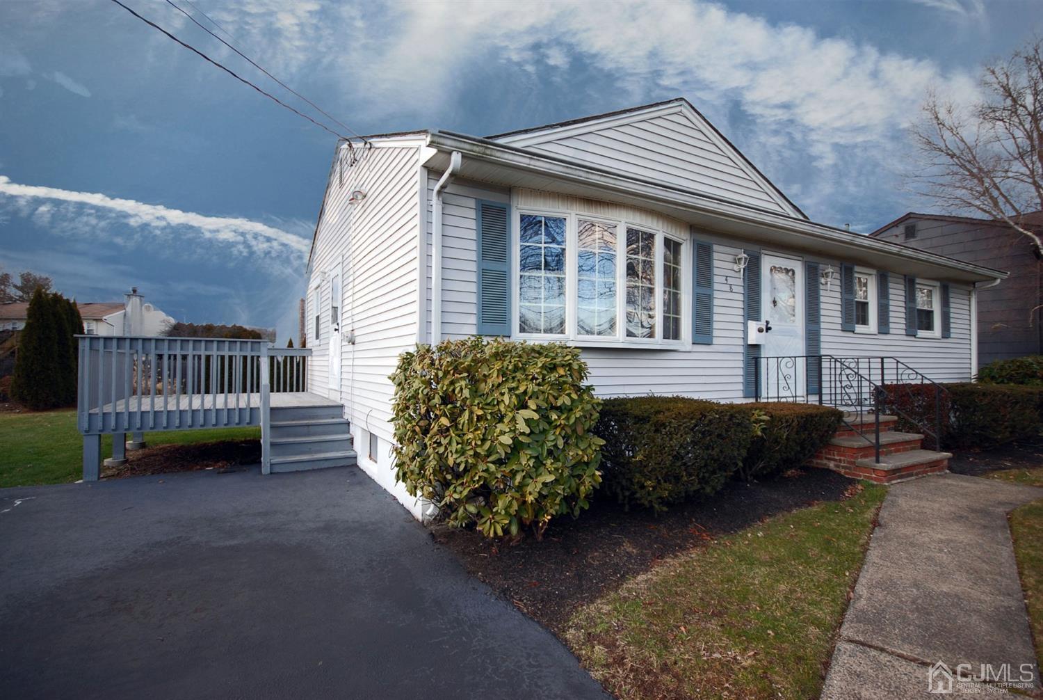 48 Delaware Avenue Middlesex, NJ 08846 - Photo 2 of 15 a front view of a house with garden