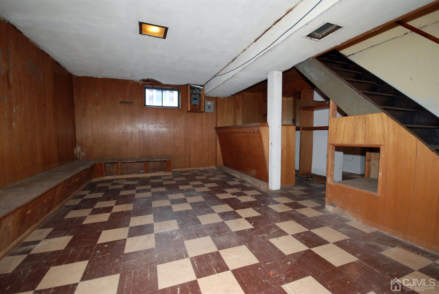 48 Delaware Avenue Middlesex, NJ 08846 - Photo 13 of 15 a view of a livingroom with a black and white checkered floor