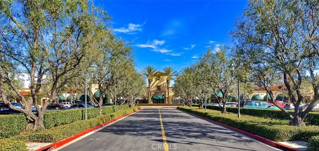 a view of cars parked in front of a building