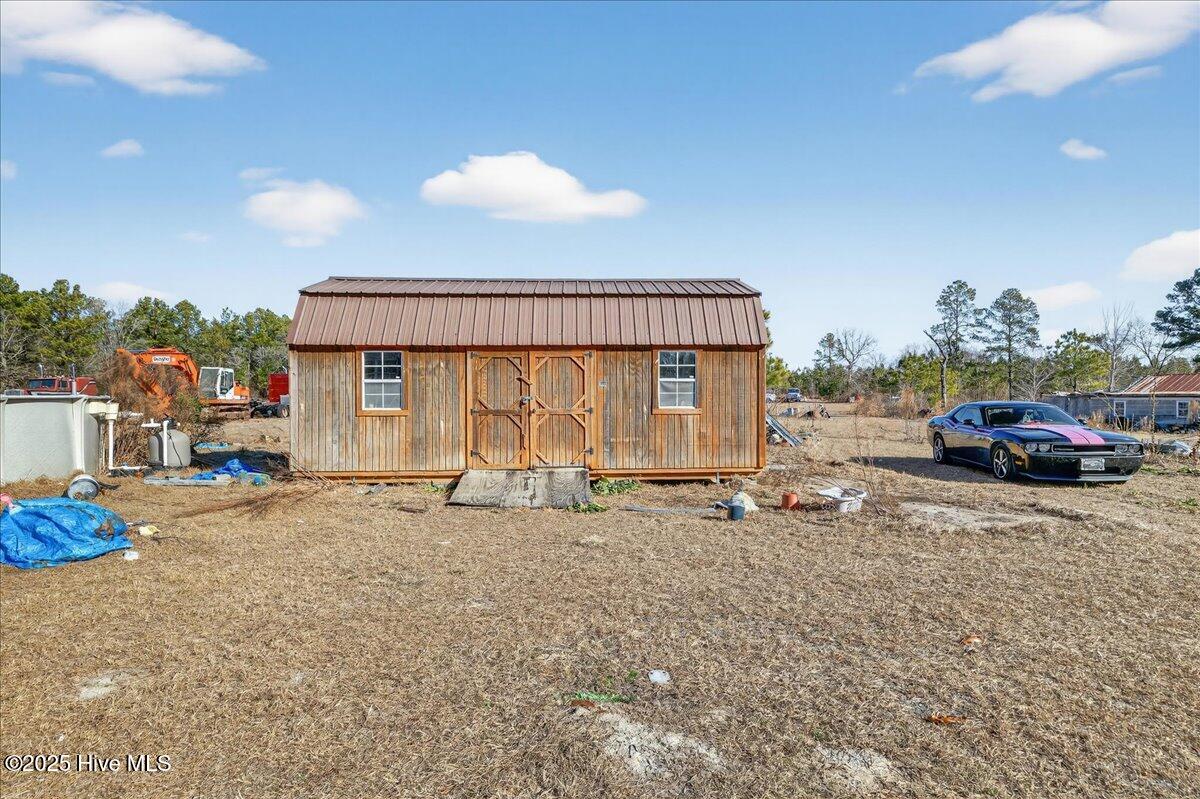 136 Kimmer Road Rockingham, NC 28379 - Photo 6 of 41 This Shed doesn't stay (The small grey one remains with purchase)