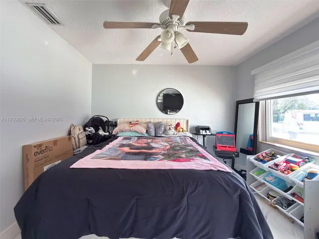 a view of a brick wall with windows