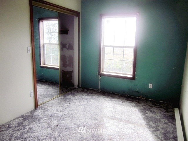 266 Stringtown Road Ilwaco, WA 98624 - Photo 8 of 13 a view of a room that has a window