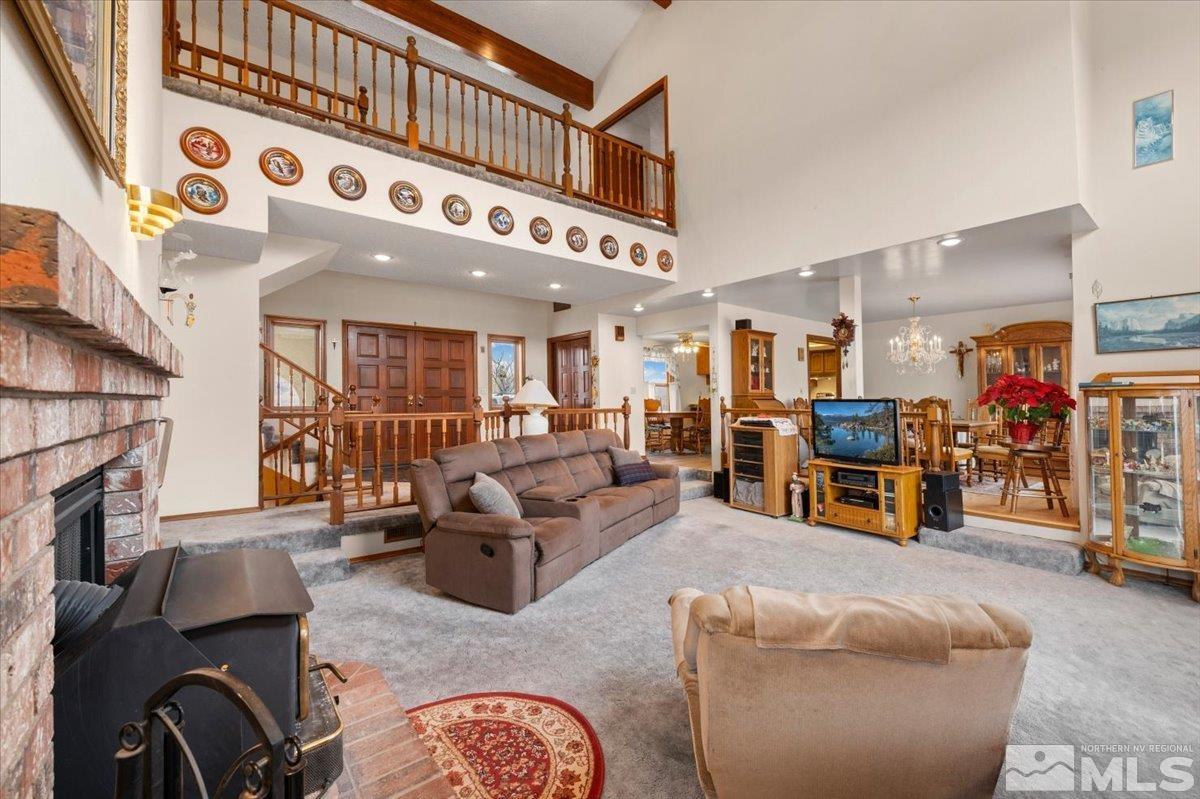 5790 Whiskey Springs Road Reno, NV 89510 - Photo 1 of 40 a living room with furniture and a fireplace