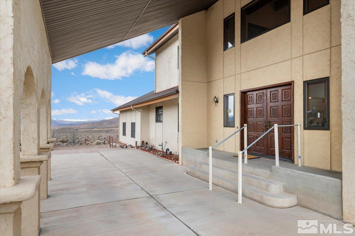 5790 Whiskey Springs Road Reno, NV 89510 - Photo 7 of 40 a view of a terrace with chairs