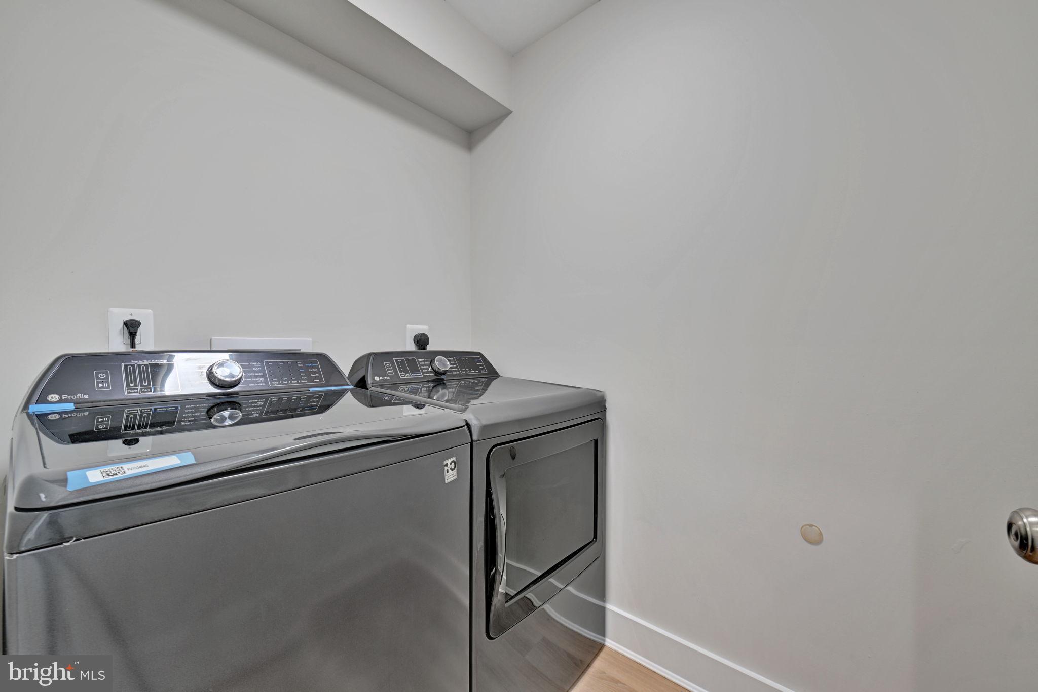 1205 Hawthorne Street Shady Side, MD 20764 - Photo 25 of 35 a utility room with dryer and washer