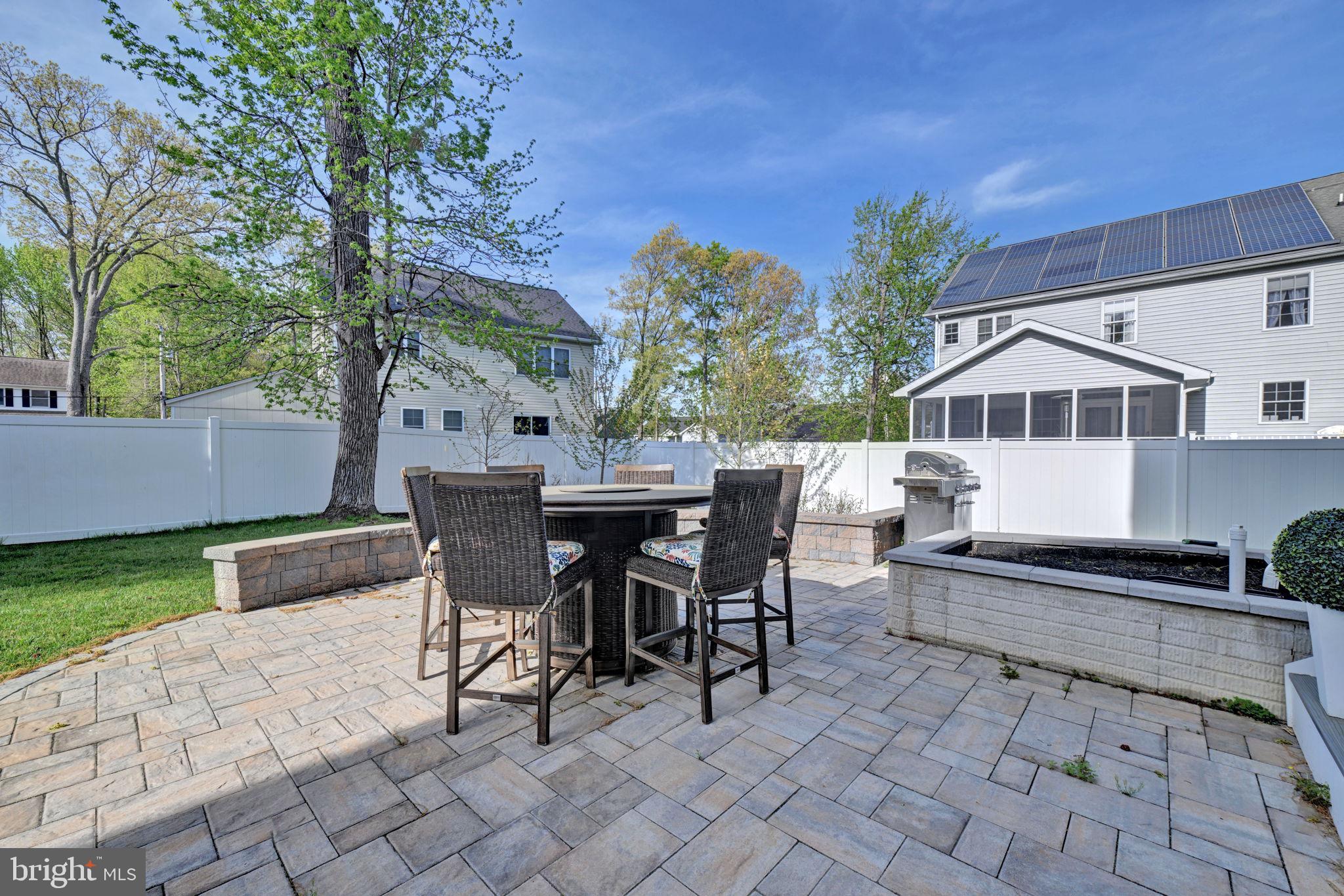 1205 Hawthorne Street Shady Side, MD 20764 - Photo 29 of 35 a view of a patio with table and chairs and potted plants