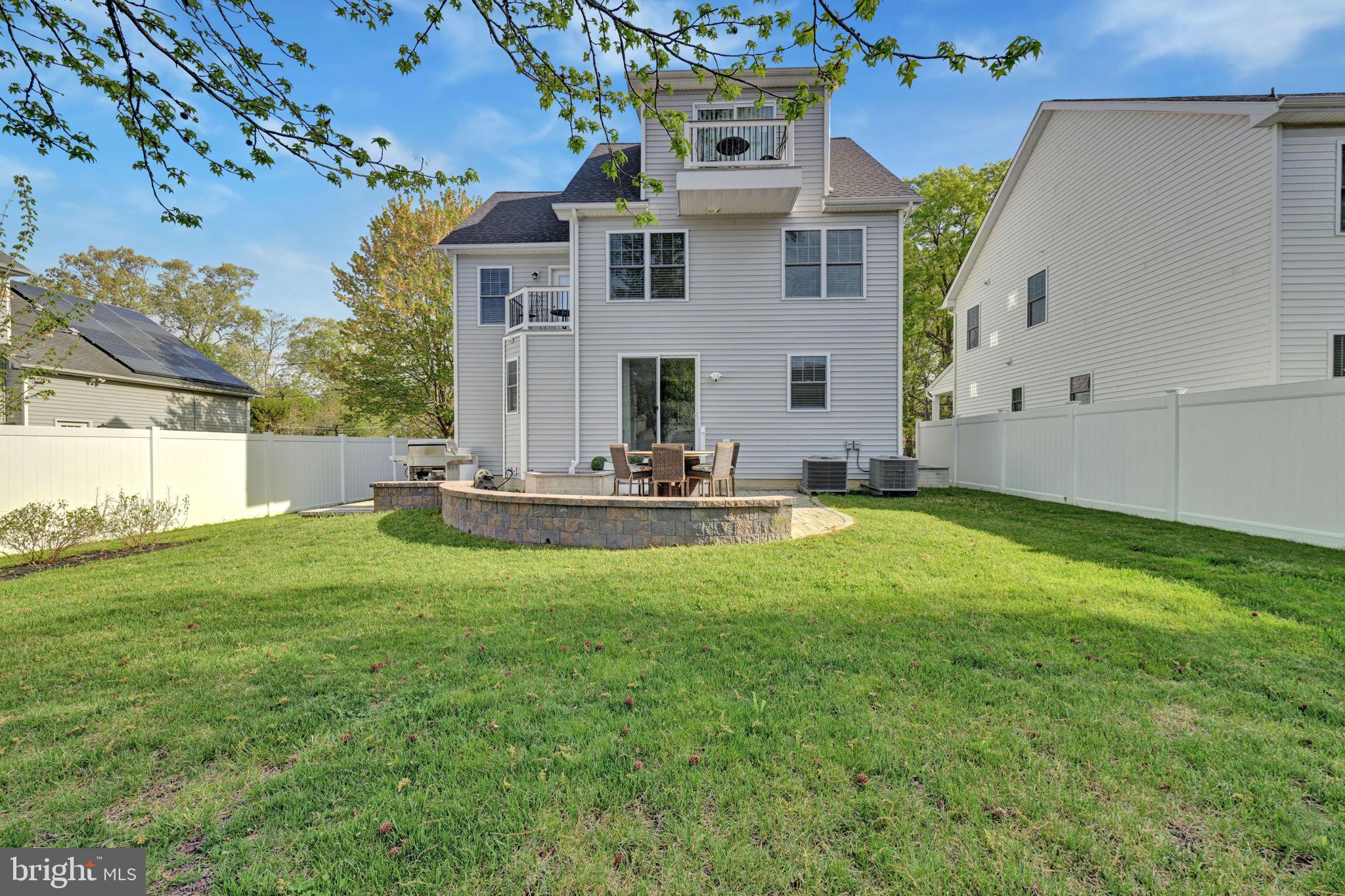 1205 Hawthorne Street Shady Side, MD 20764 - Photo 31 of 35 a view of a house with a yard