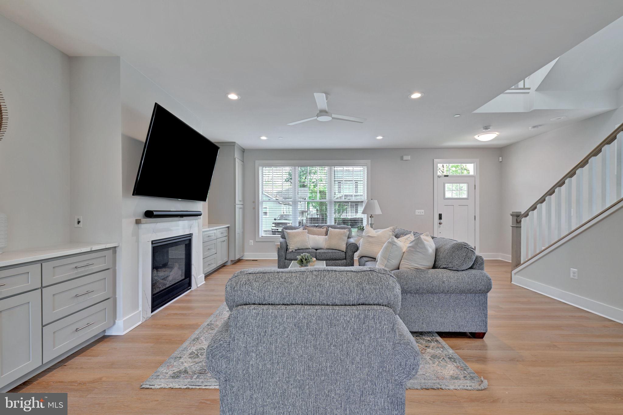 1205 Hawthorne Street Shady Side, MD 20764 - Photo 10 of 35 a living room with furniture and a flat screen tv