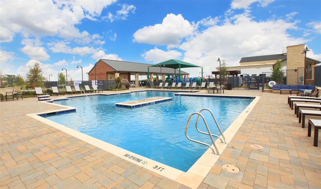 1522 Bushman Lane Forney, TX 75126 - Photo 14 of 18 a view of a swimming pool with outdoor seating