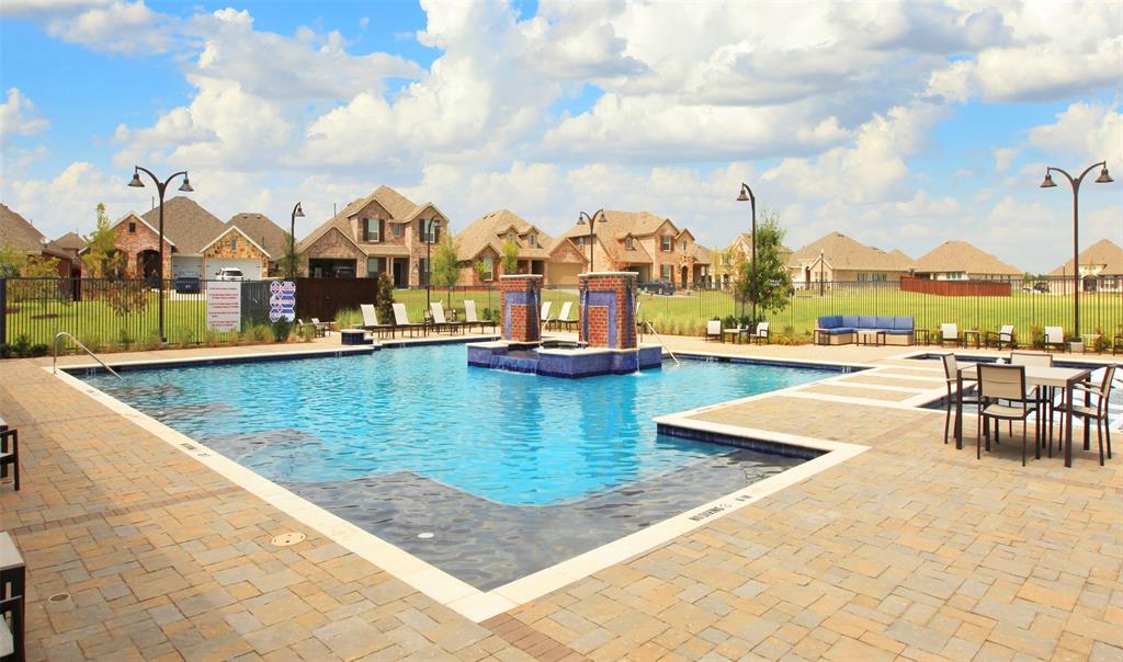 1522 Bushman Lane Forney, TX 75126 - Photo 10 of 18 an aerial view of residential houses with outdoor space