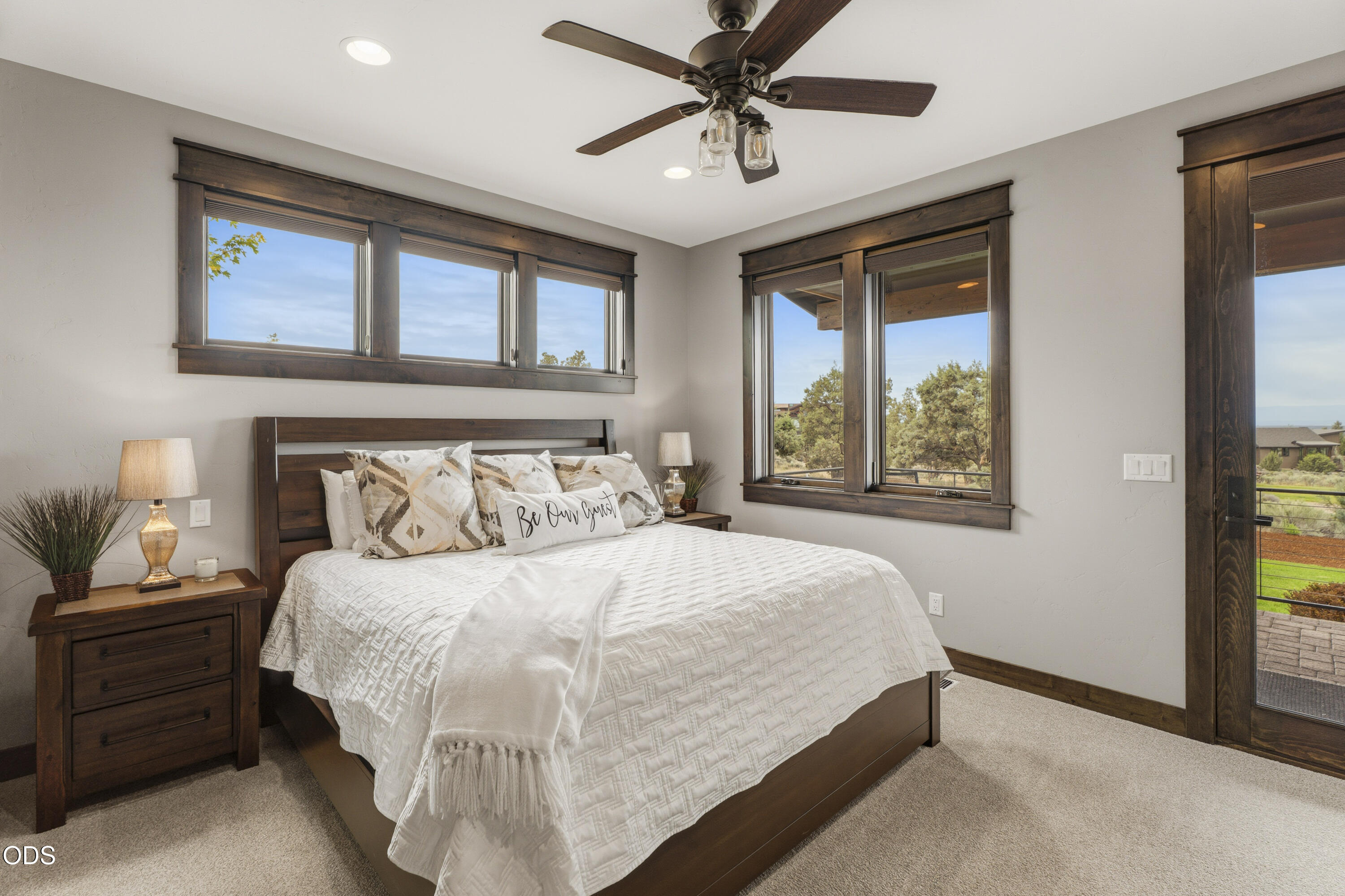 15935 South W Brasada Ranch Road Powell Butte, OR 97753 - Photo 14 of 45 a bedroom with a large bed and a window