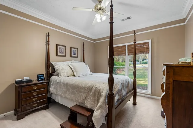 a bathroom with a sink vanity and mirror