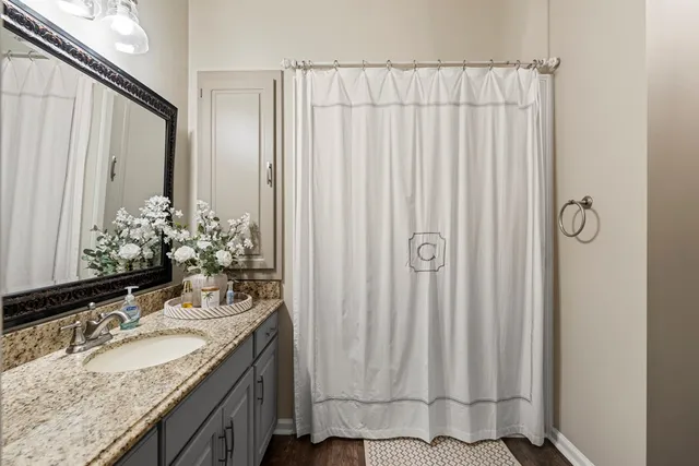 a view of a swimming pool with chairs