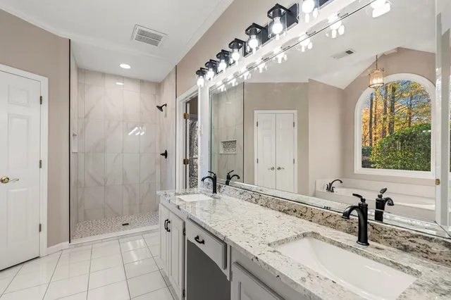 an aerial view of a house with outdoor space