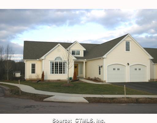 6 Dewberry Court Suffield, CT 06078 - Photo 1 of 1 a view of a white house with a big yard and large trees