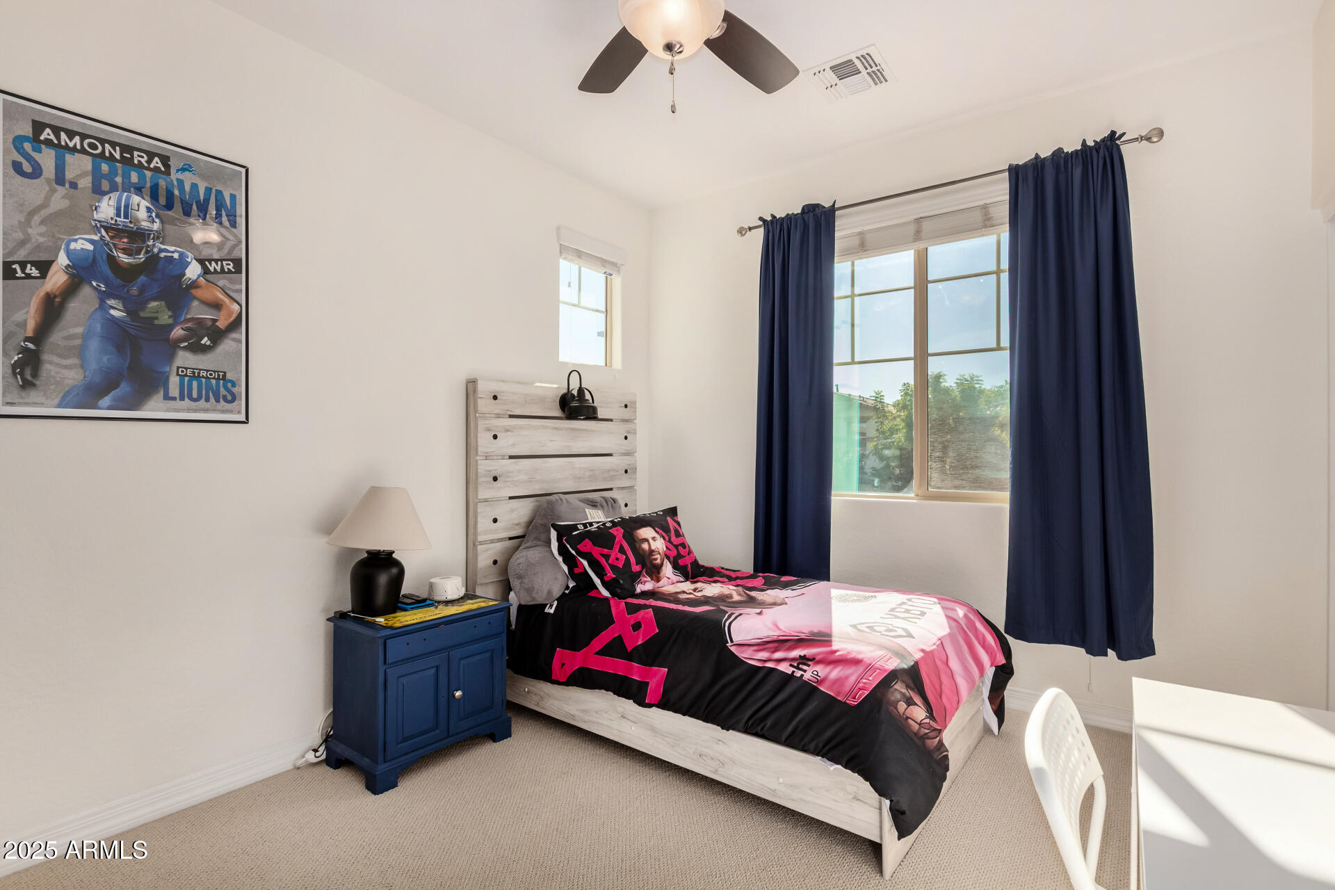 3420 East Indigo Street Gilbert, AZ 85298 - Photo 17 of 27 a bedroom with a bed and a window