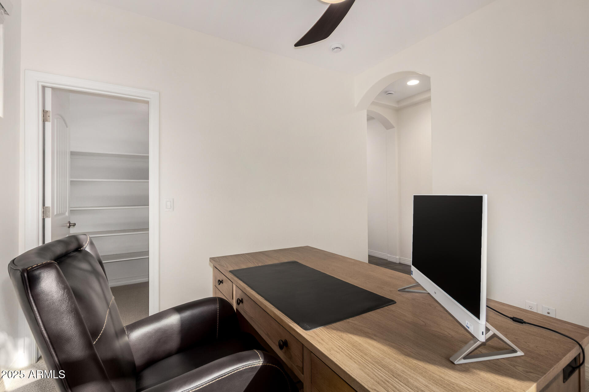 3420 East Indigo Street Gilbert, AZ 85298 - Photo 21 of 27 a room with furniture and a window