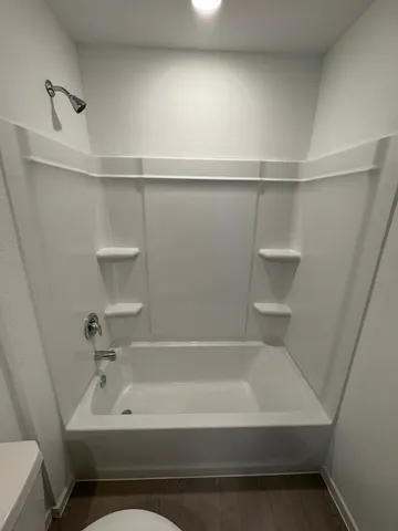 a bathroom with a bathtub