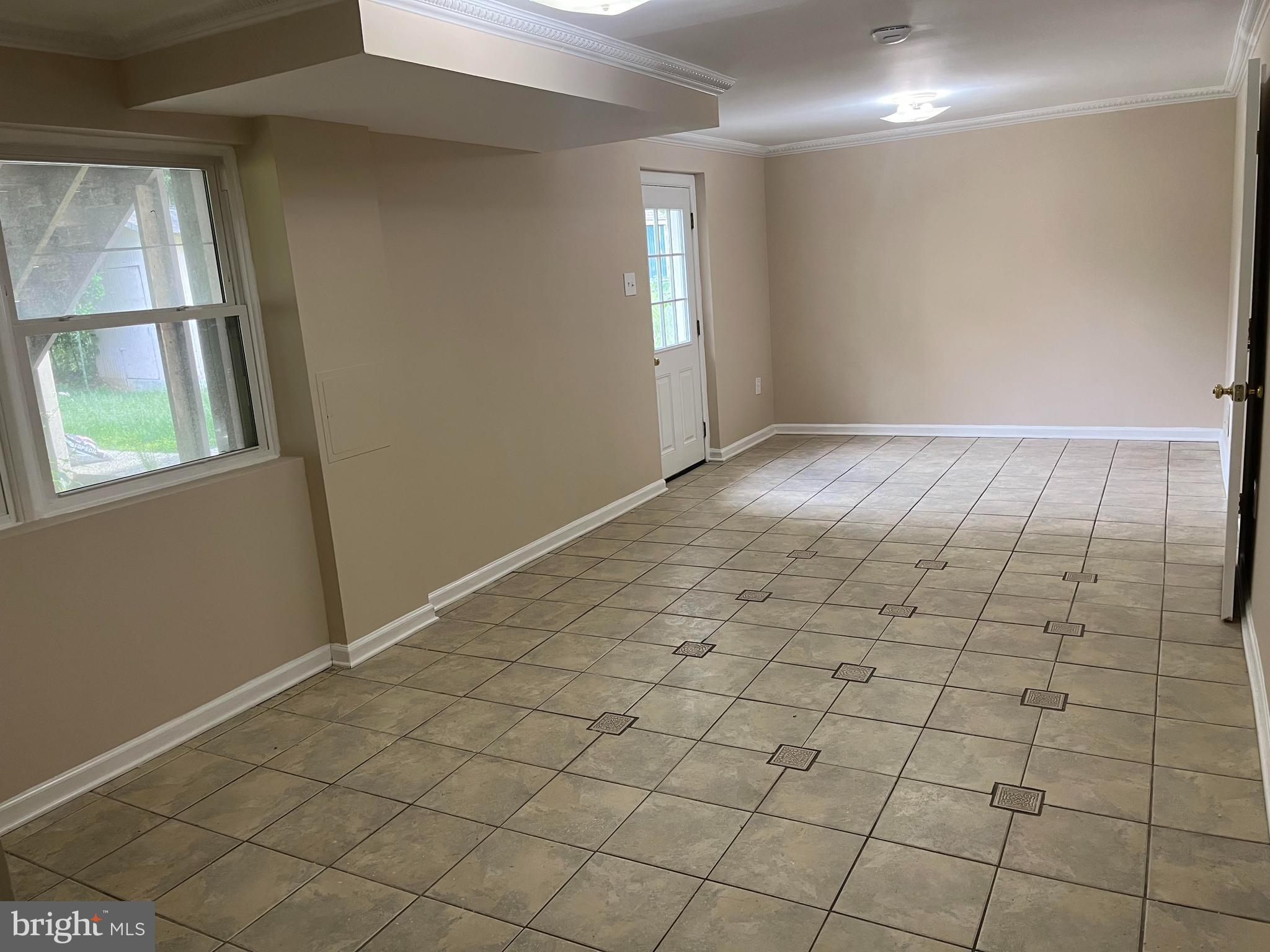 4105 Isbell Street Silver Spring, MD 20906 - Photo 14 of 19 a view of an empty room and window