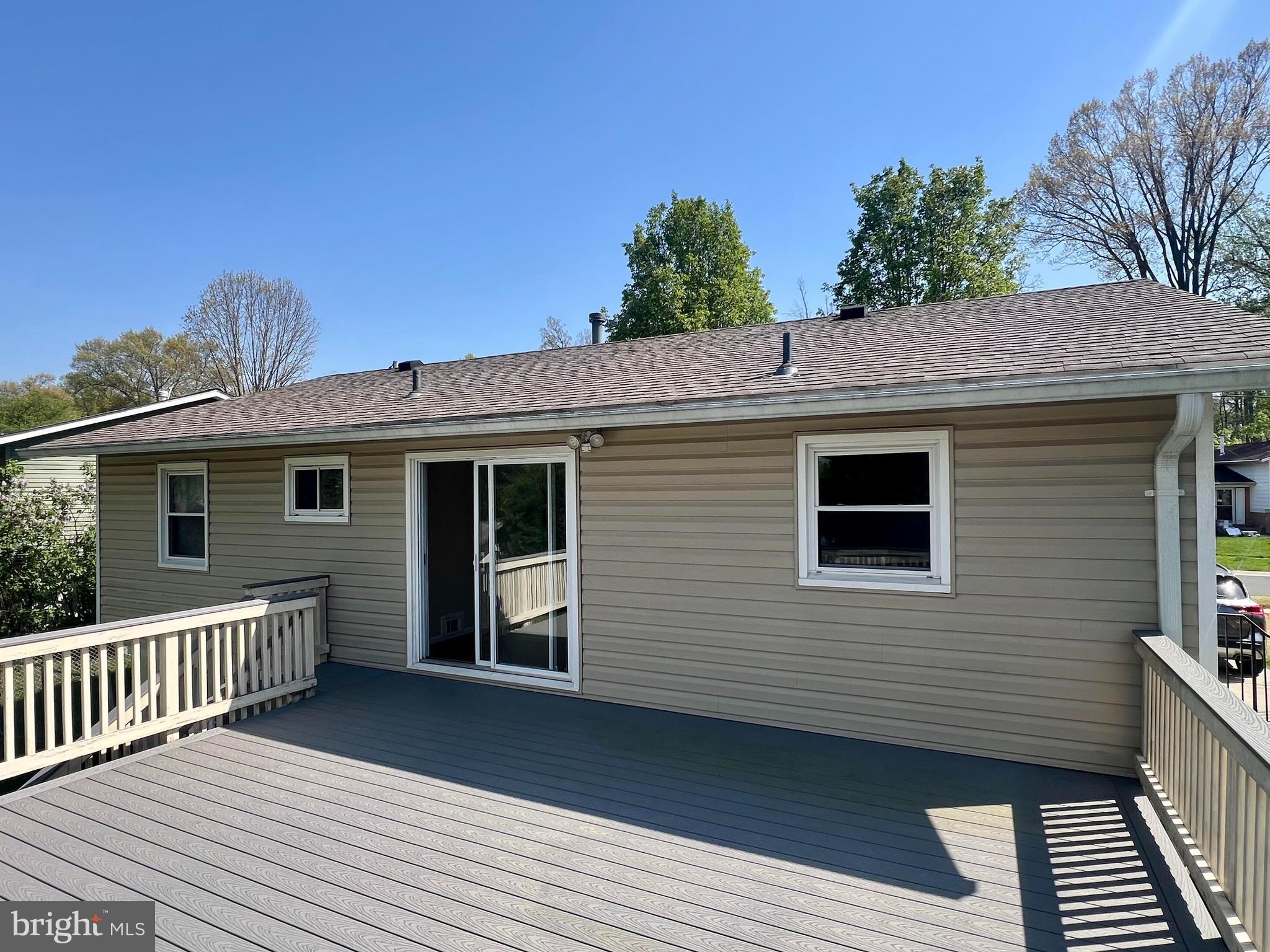 4105 Isbell Street Silver Spring, MD 20906 - Photo 4 of 19 a view of a house with a deck