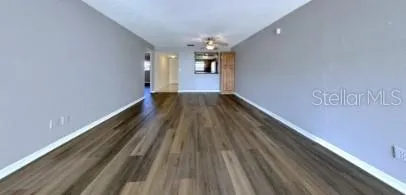 a view of gallery with wooden floor