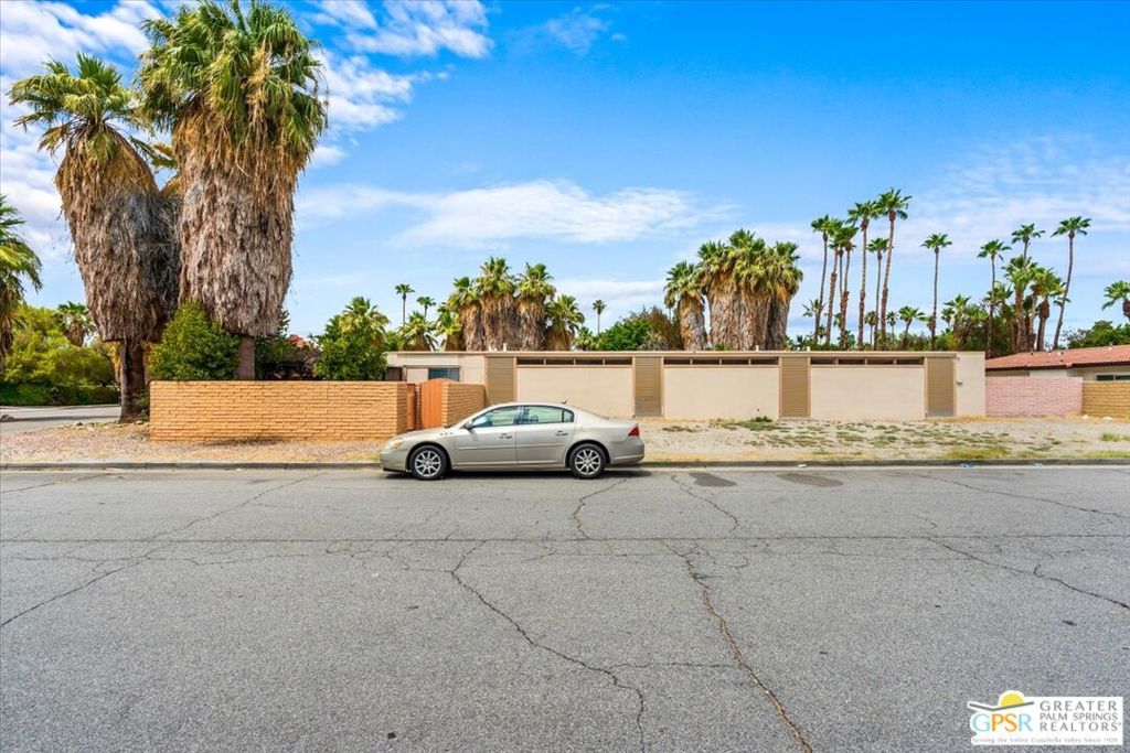 490 South Compdre Road Palm Springs, CA 92262 - Photo 9 of 15 a view of a terrace with a yard