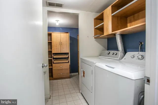 a view of entry way with wooden door