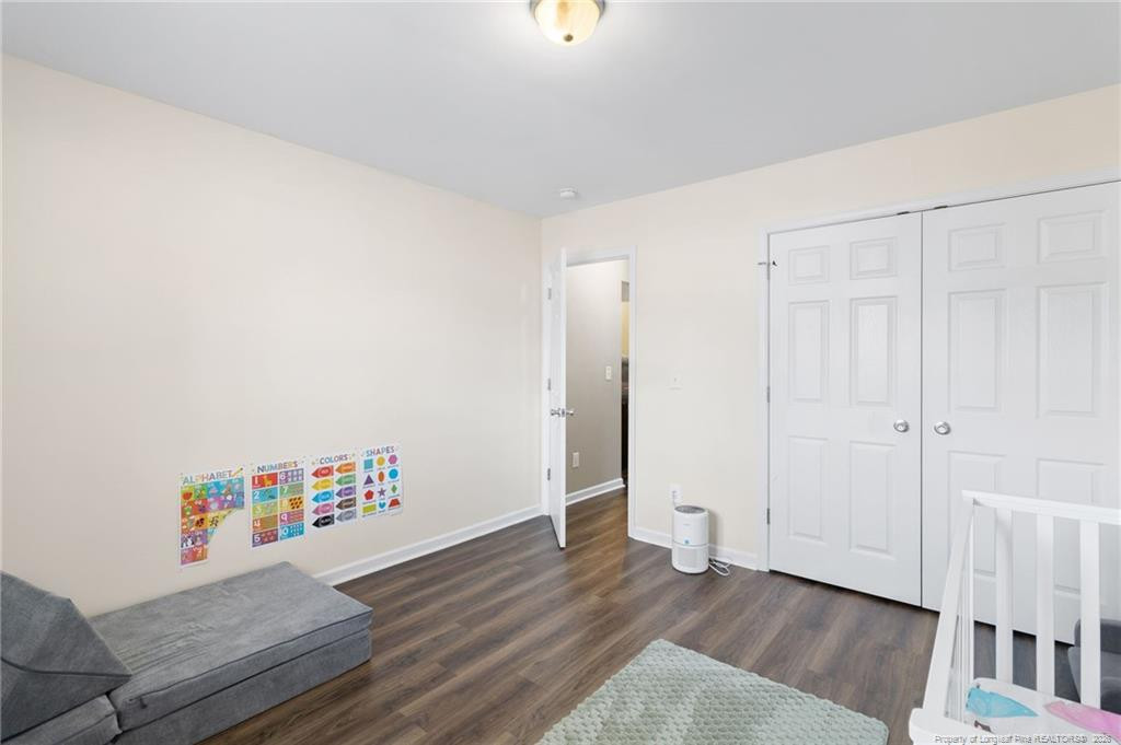 46 Old English Lane Spring Lake, NC 28390 - Photo 26 of 36 a view of an empty room with wooden floor