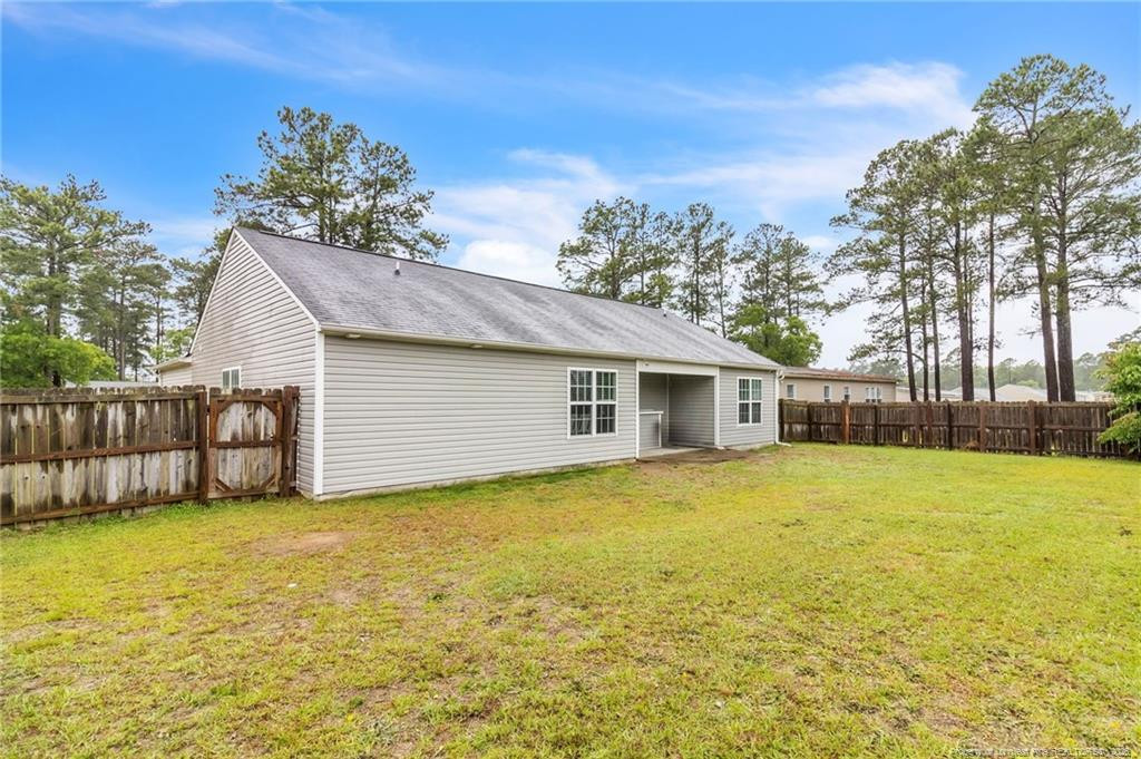 46 Old English Lane Spring Lake, NC 28390 - Photo 36 of 36 a view of a house with a yard