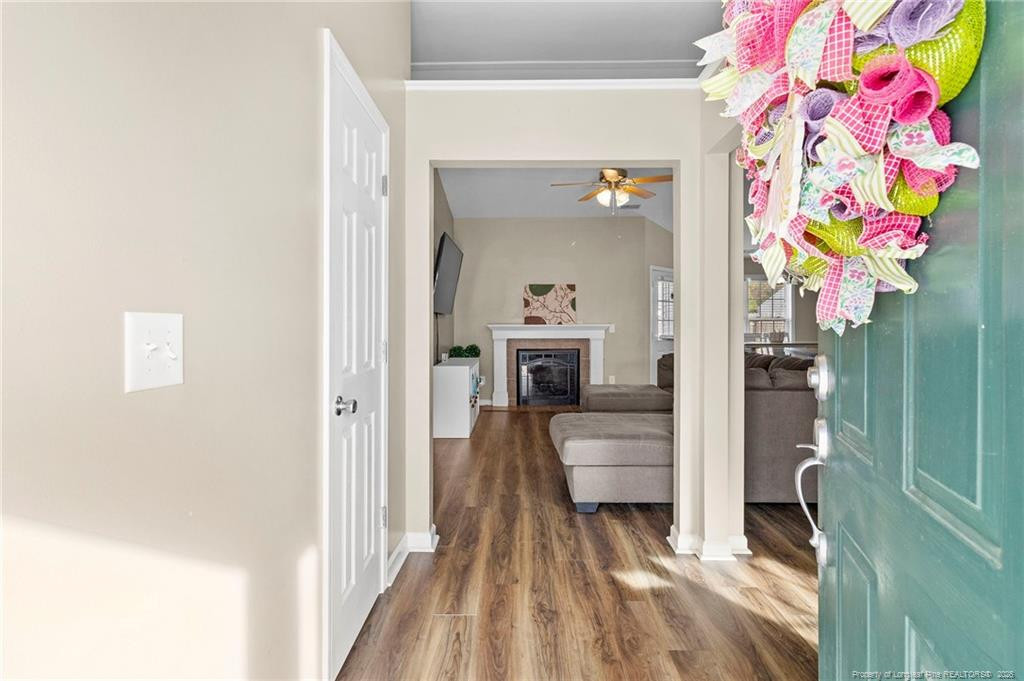46 Old English Lane Spring Lake, NC 28390 - Photo 9 of 36 a view of entryway with furniture and wooden floor