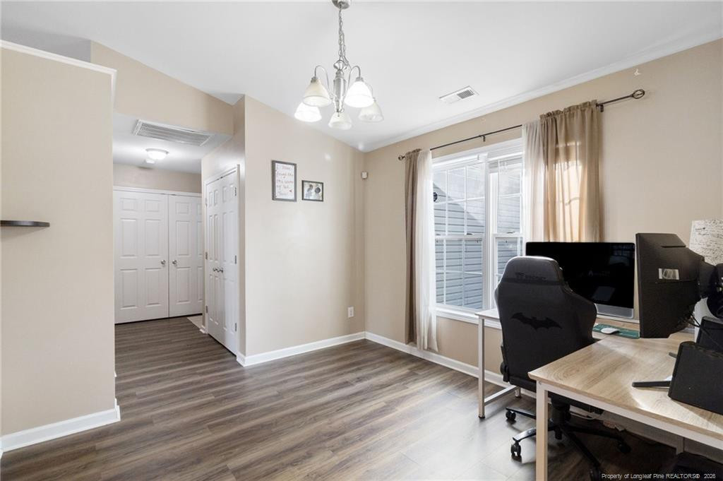 46 Old English Lane Spring Lake, NC 28390 - Photo 10 of 36 a view of a workspace with furniture and a window