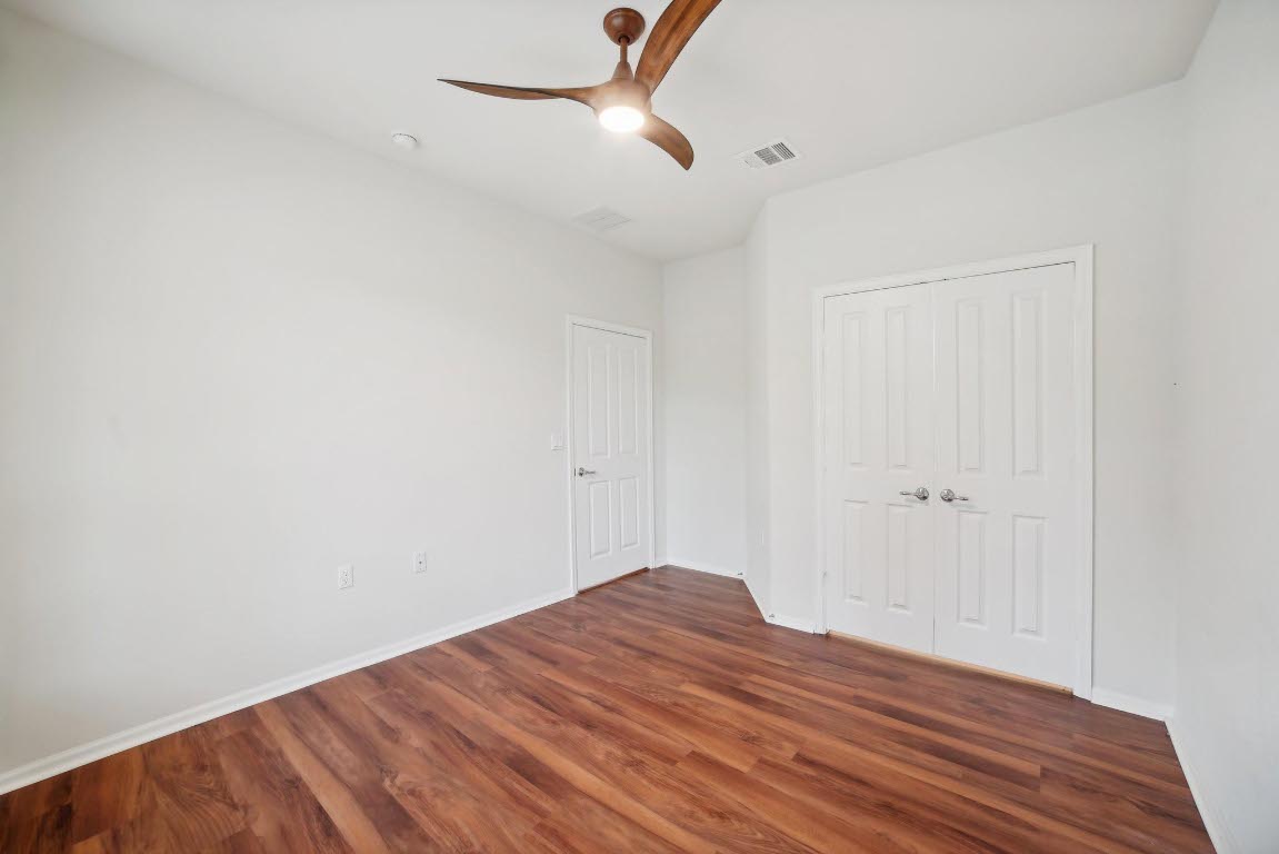207 Trinity Lane Georgetown, TX 78633 - Photo 28 of 37 a view of empty room with wooden floor