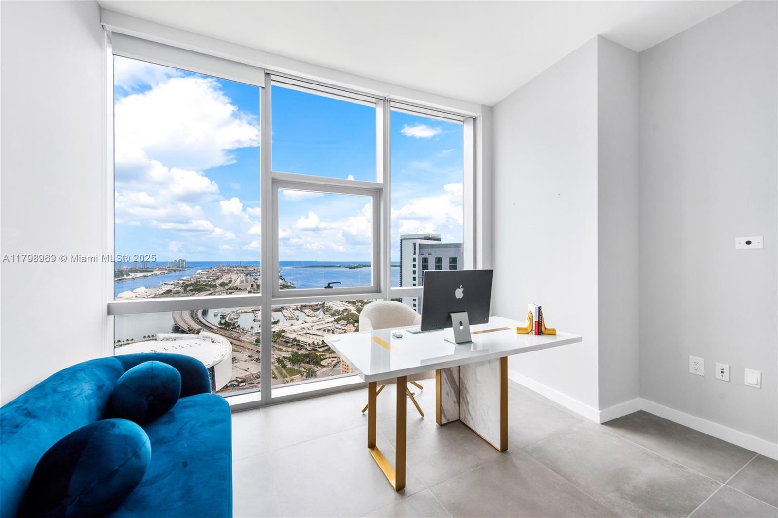 851 Northeast 1st Avenue, Unit 4011 Miami, FL 33132 - Photo 25 of 37 a living room with furniture and floor to ceiling window