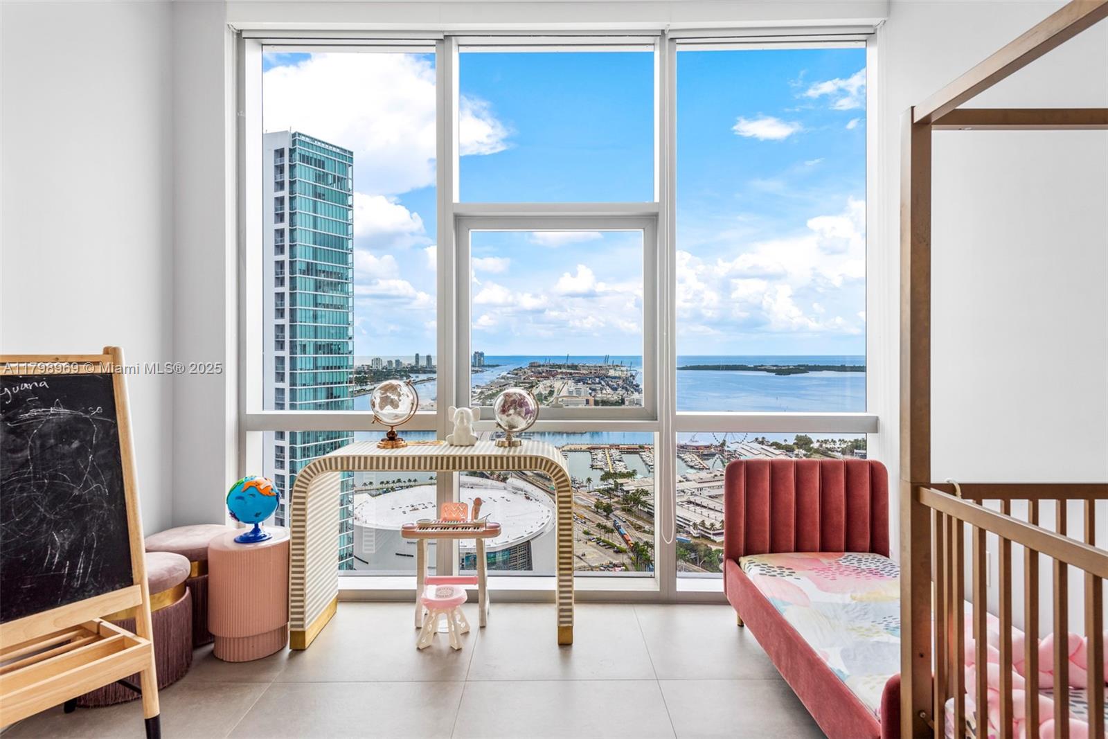 851 Northeast 1st Avenue, Unit 4011 Miami, FL 33132 - Photo 31 of 37 a view of a room with furniture and a large window