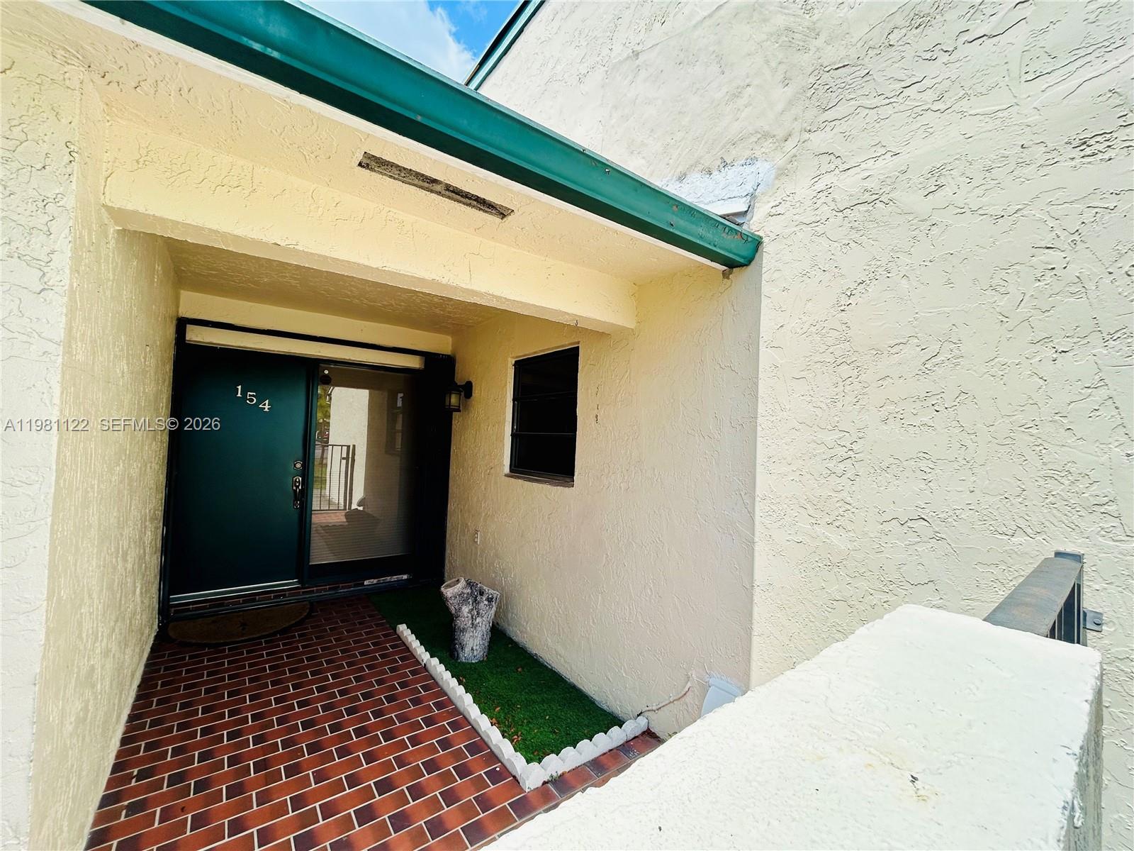 10818 Southwest 72nd Street, Unit 154 Miami, FL 33173 - Photo 16 of 28 a bathroom with a toilet