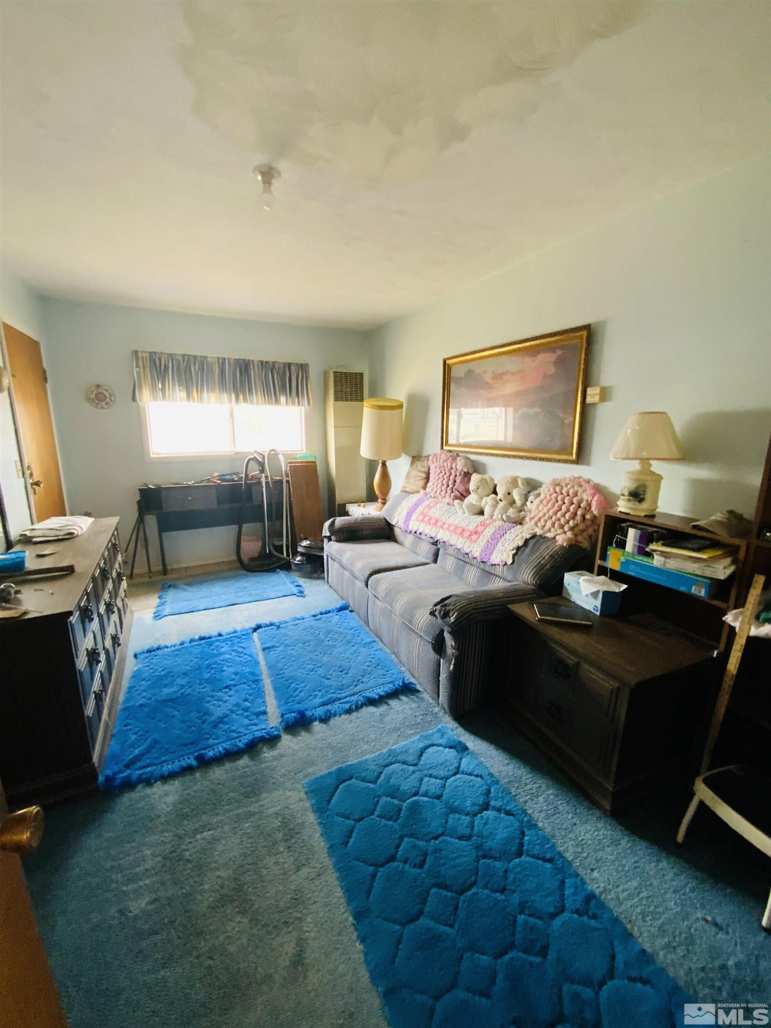 200 McLean Road Fallon, NV 89406 - Photo 12 of 16 a bedroom with furniture and a window